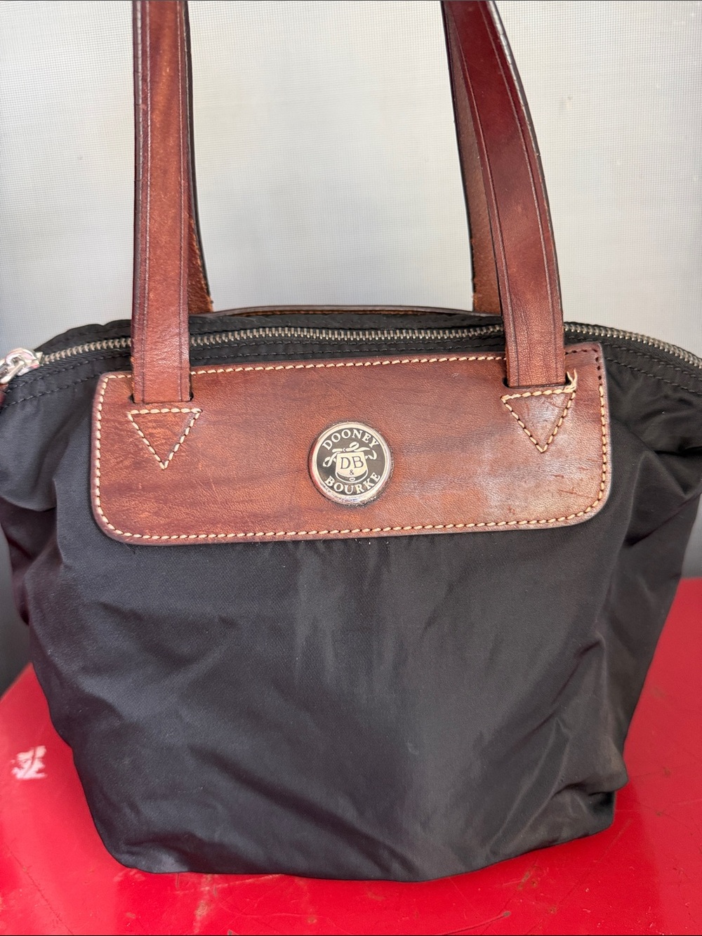 Dooney & Bourke Black Nylon Toiletry Bag with Brown Leather Trim